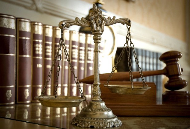 Antique scales of justice on desk